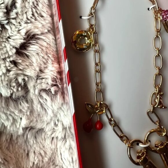 A New Day Pastry Bow And Cherry Charm Phone Strap Target Cell Wristlet Gold - Picture 4 of 4